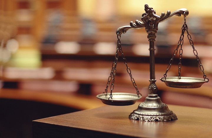 Scales of justice representing statute of limitations on car accident claims