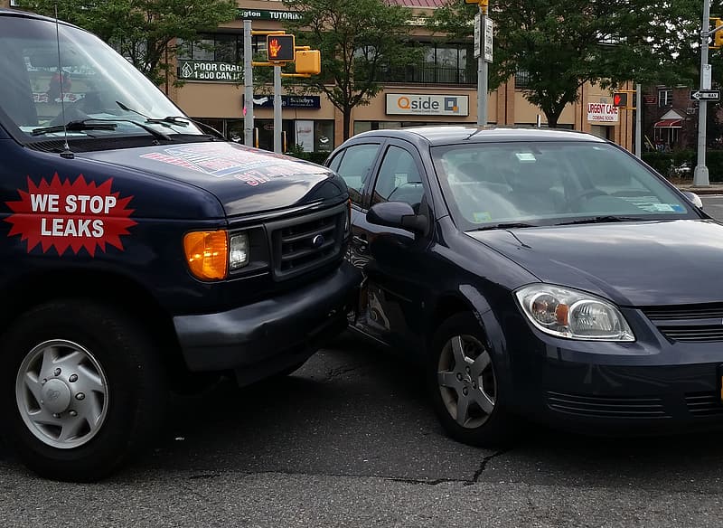 sedan hitting a car from side with slight property damage