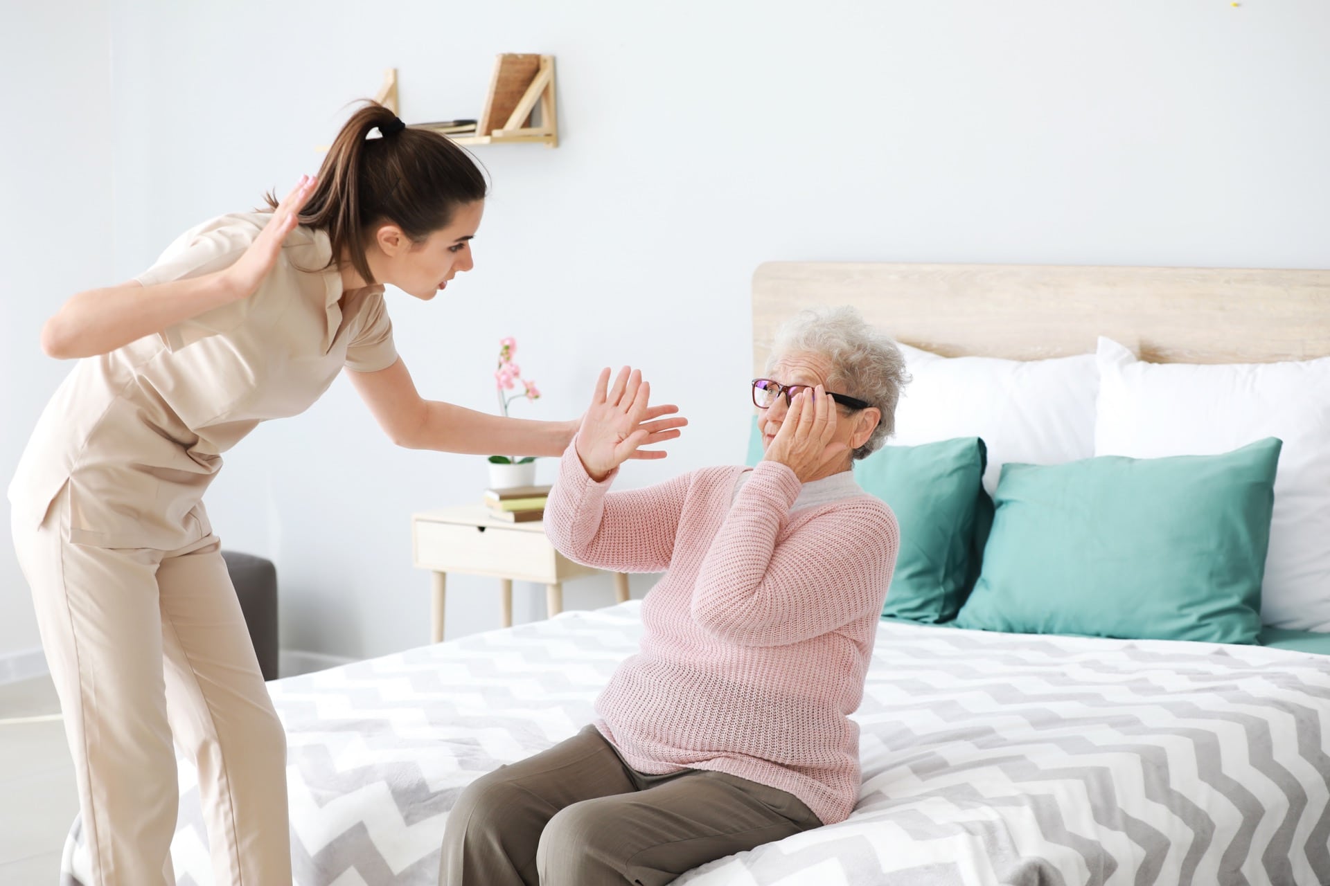 Caregiver Going to Hit Elderly Lady
