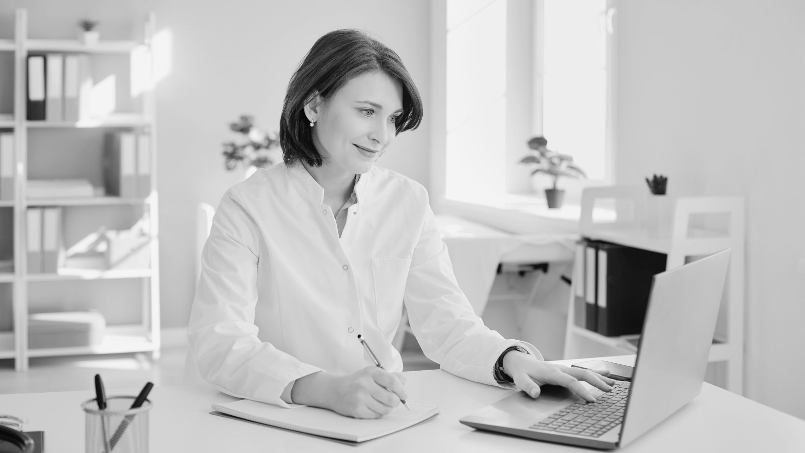 doctor entering information for medical billing