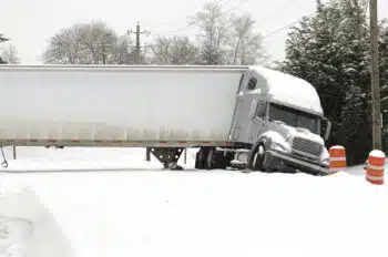 Truck jackknifed in snow